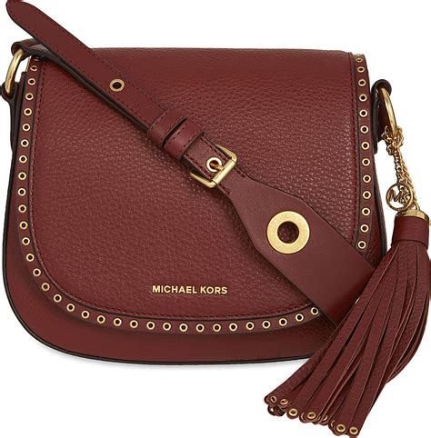 michael kors carry saddle bag